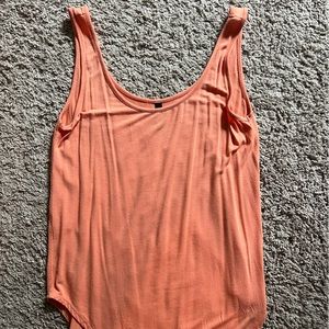 Peachy colored relaxed fit Savvi tank with scoop front and back neck size XS/S